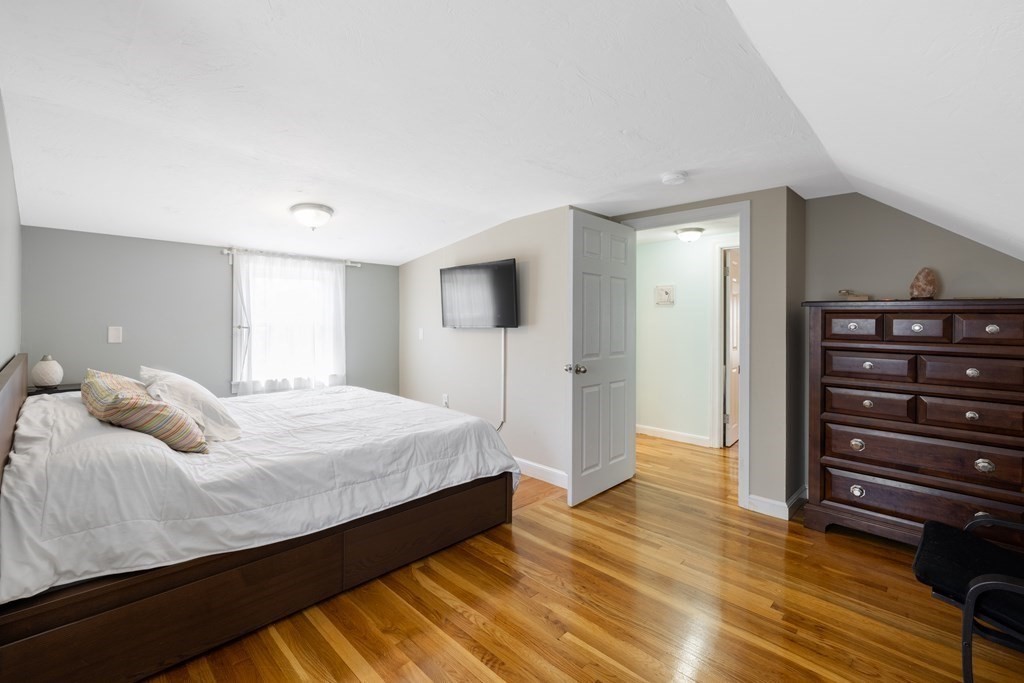 3 Pine Road Randolph, MA 02368 - Photo 17 of 30 a bedroom with a bed and a dresser