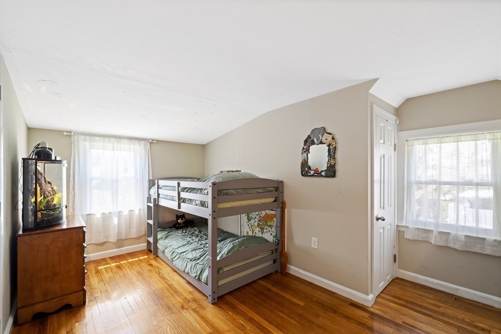 3 Pine Road Randolph, MA 02368 - Photo 20 of 30 a bedroom with furniture and a window