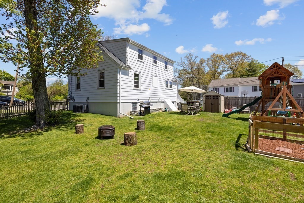 3 Pine Road Randolph, MA 02368 - Photo 27 of 30 a view of a house with a back yard