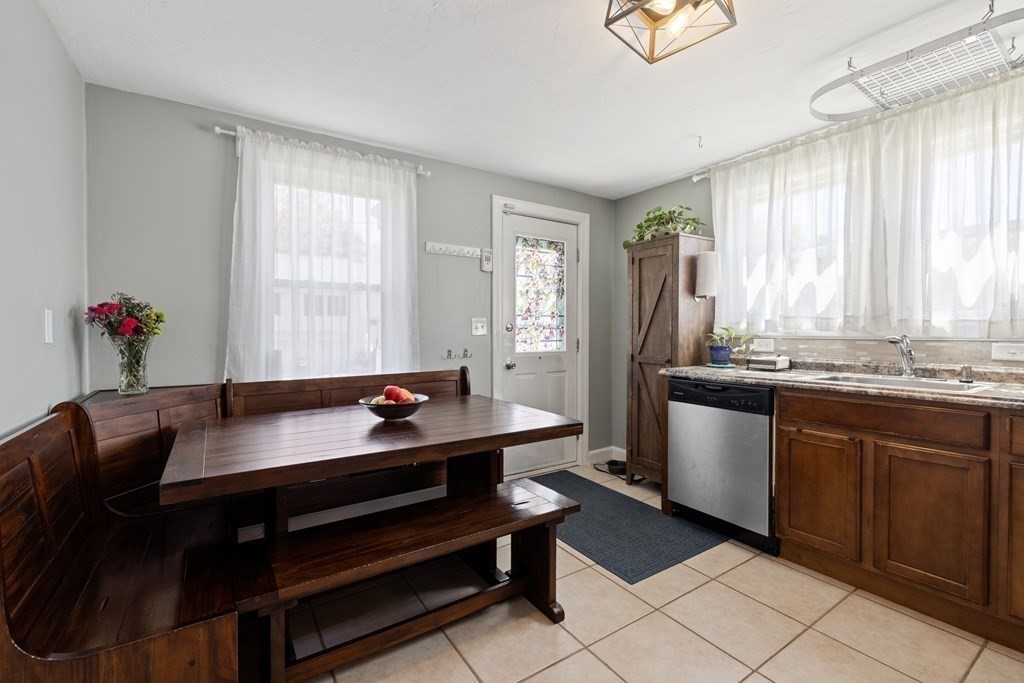 3 Pine Road Randolph, MA 02368 - Photo 5 of 30 a room with granite countertop furniture and windows