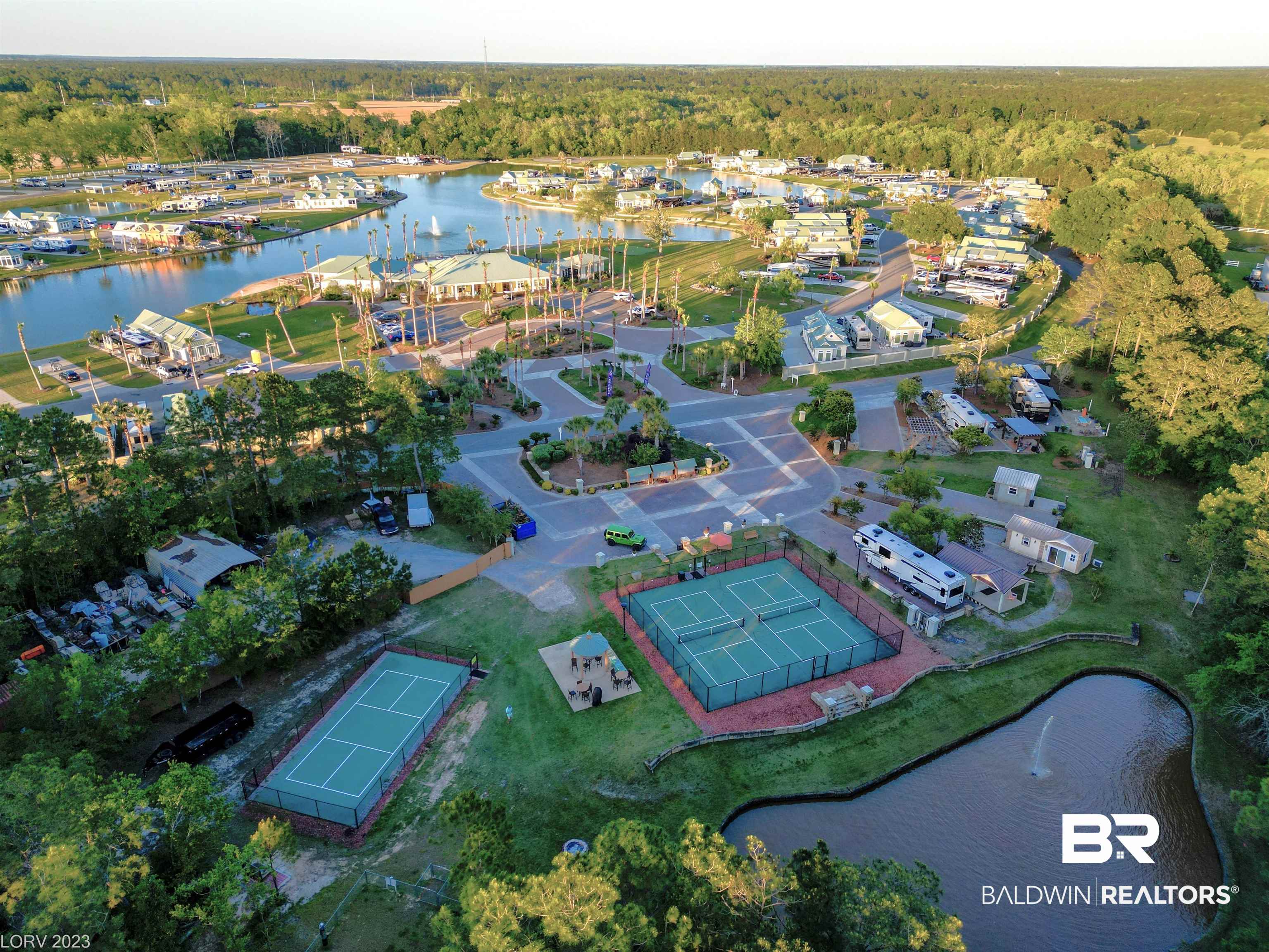 11869 Gateway Drive Elberta, AL 36530 - Photo 59 of 78 Aerial view with a wooded view and a water view