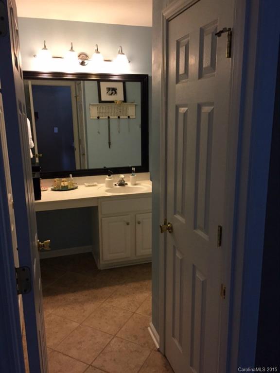 745 Shellstone Place, Unit 83 Fort Mill, SC 29708 - Photo 14 of 20 a bathroom with a sink vanity and mirror