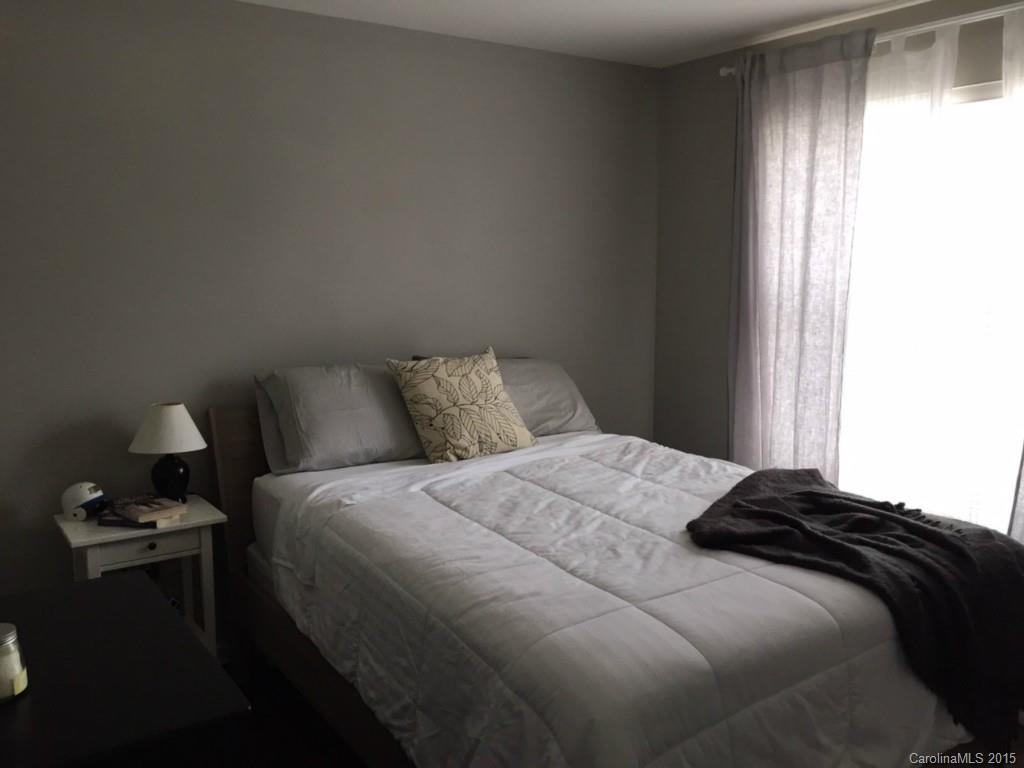 745 Shellstone Place, Unit 83 Fort Mill, SC 29708 - Photo 16 of 20 a bedroom with a bed and window