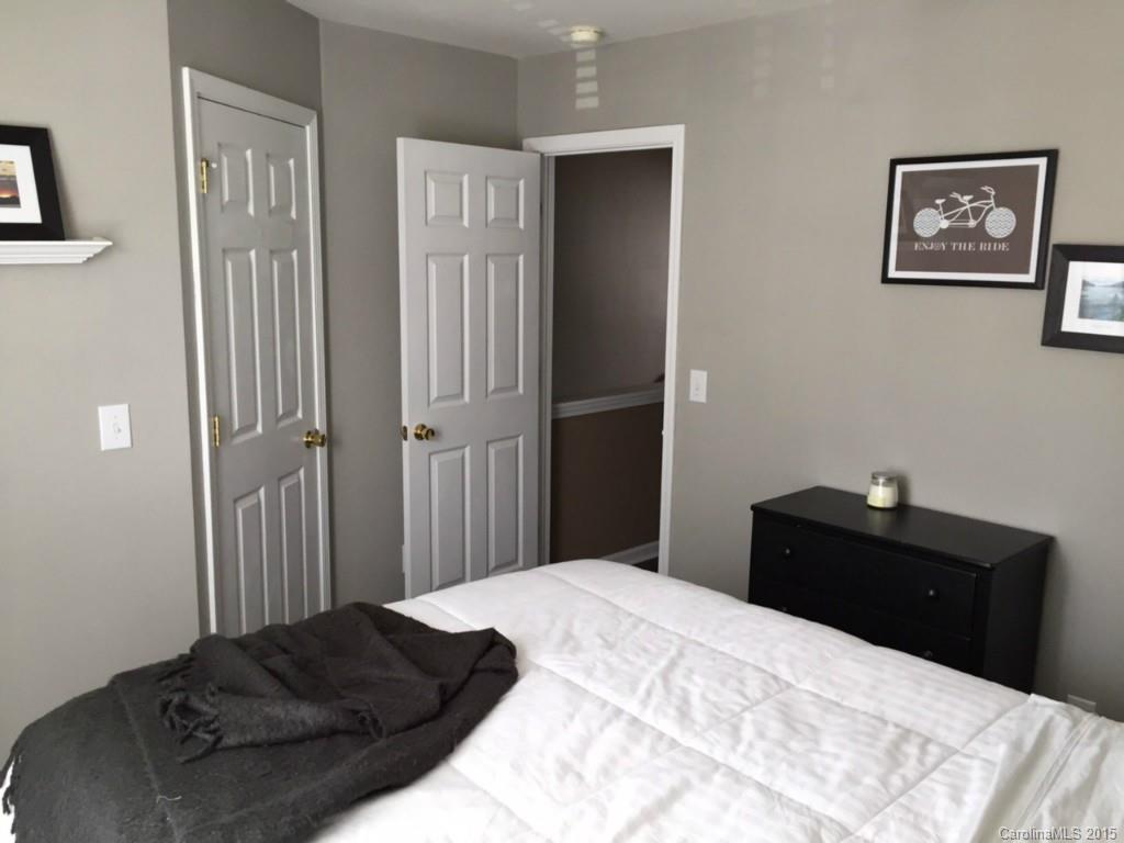 745 Shellstone Place, Unit 83 Fort Mill, SC 29708 - Photo 17 of 20 a bedroom with a bed and a dresser