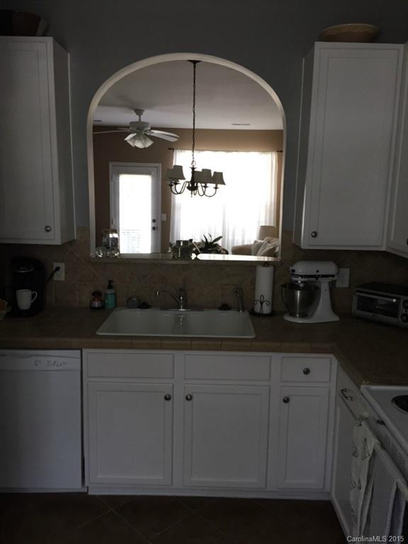 745 Shellstone Place, Unit 83 Fort Mill, SC 29708 - Photo 18 of 20 a kitchen with a sink and cabinets