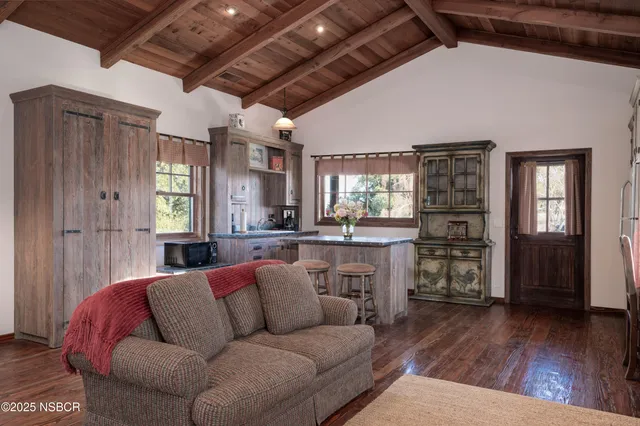 an aerial view of residential house and green space