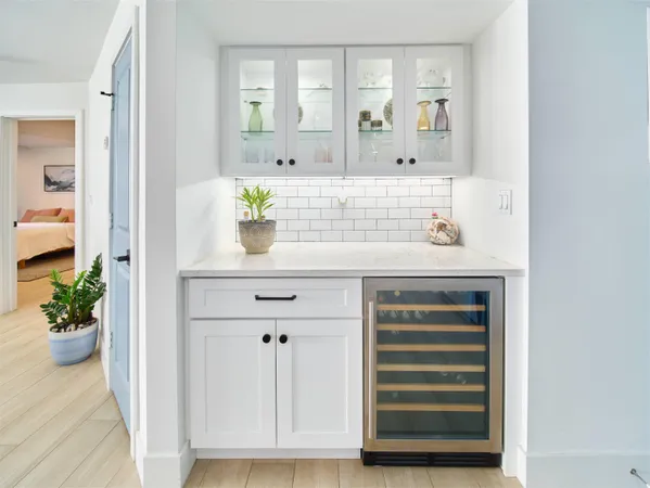 a bathroom with a sink double vanity and a mirror
