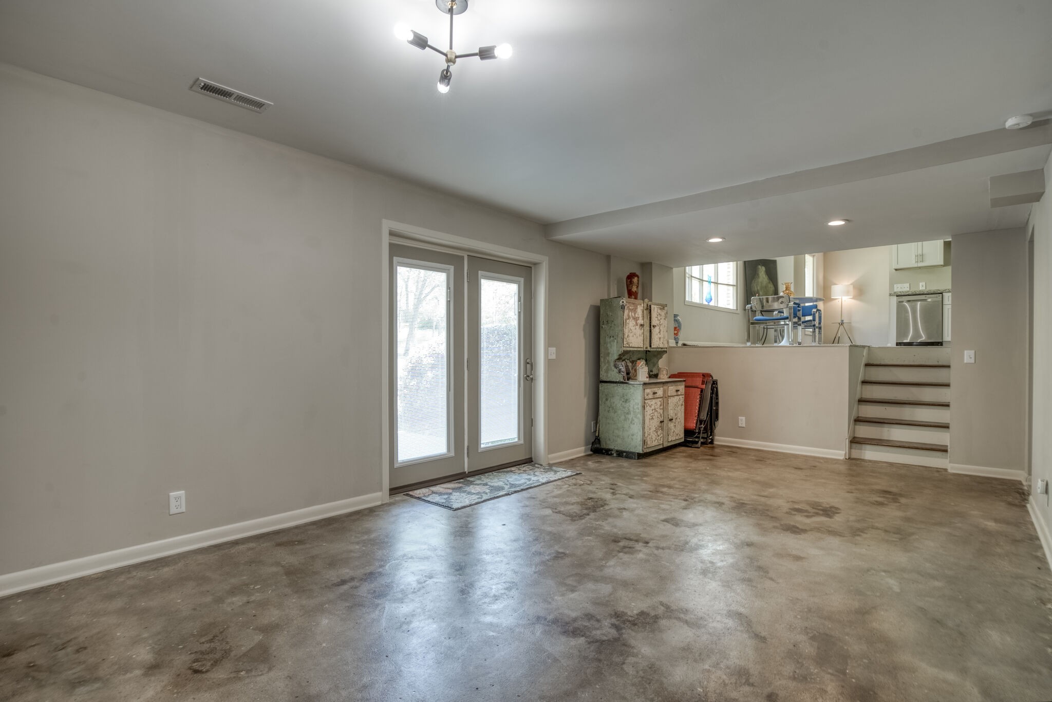 4134 West Hamilton Road Nashville, TN 37218 - Photo 15 of 35 an empty room with a window and chandelier