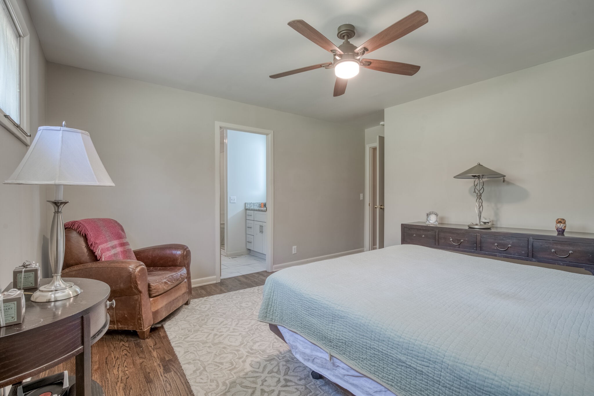 4134 West Hamilton Road Nashville, TN 37218 - Photo 22 of 35 a bedroom with a bed couch and a ceiling fan