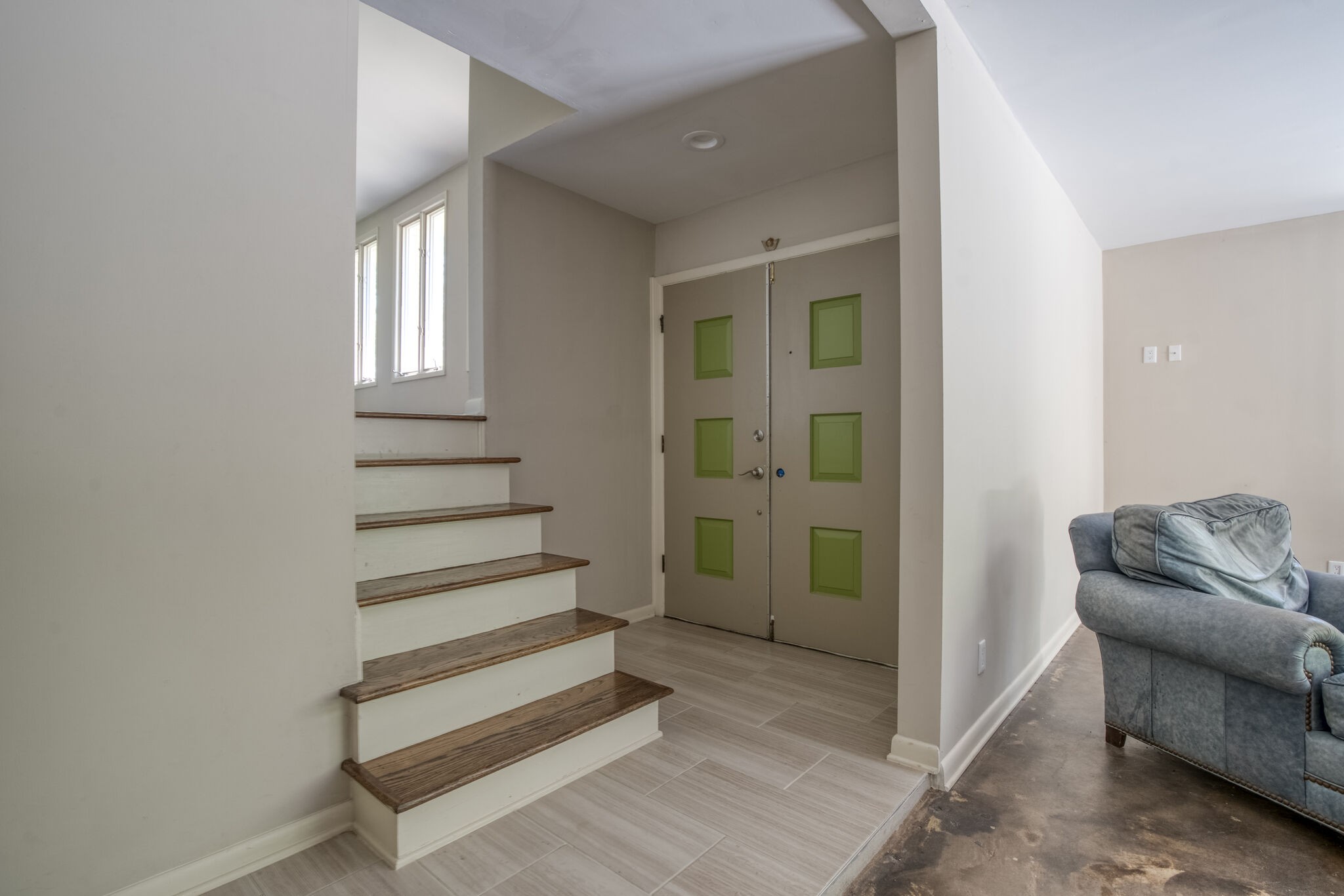 4134 West Hamilton Road Nashville, TN 37218 - Photo 5 of 35 a view of a livingroom with entryway and stairs