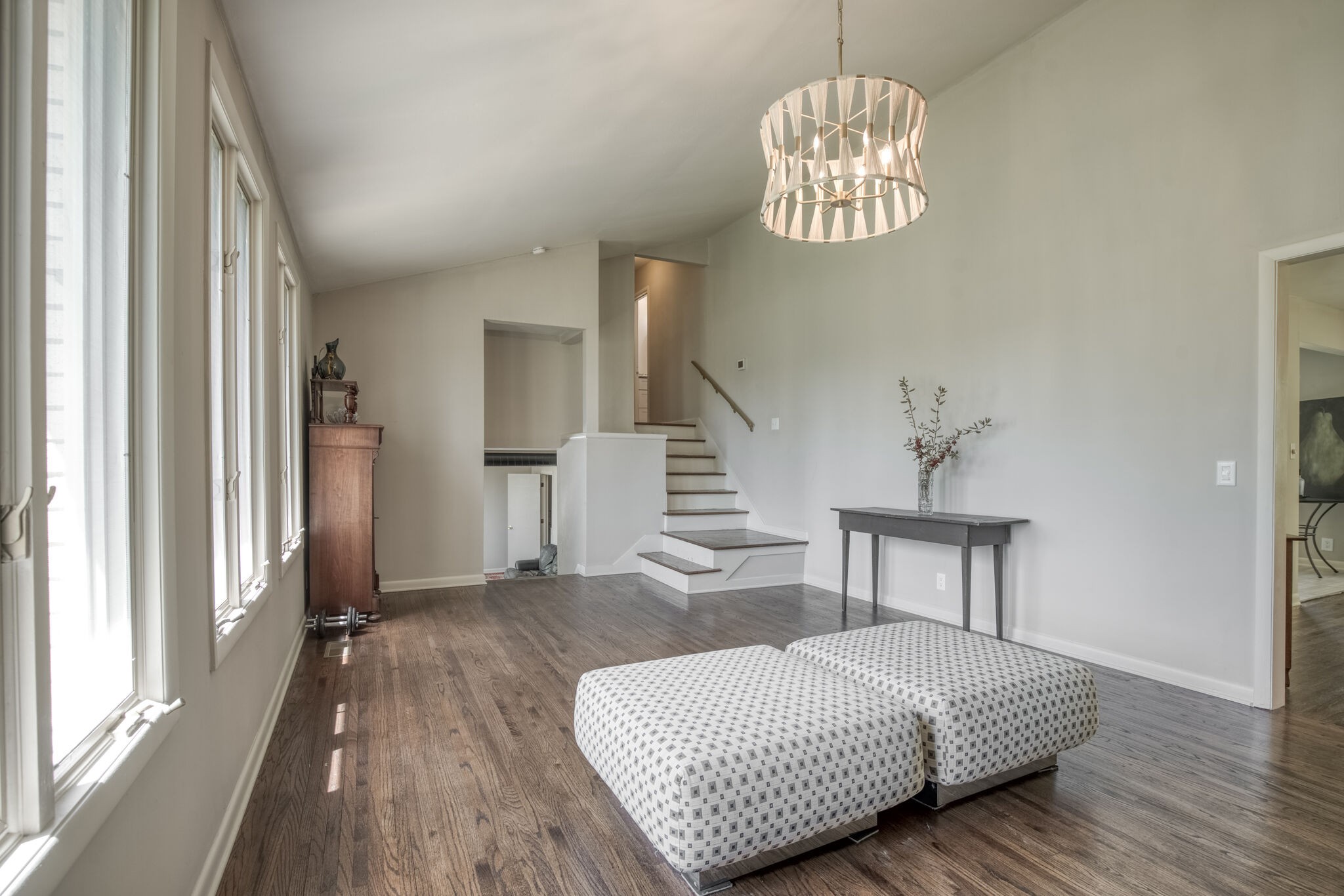 4134 West Hamilton Road Nashville, TN 37218 - Photo 8 of 35 a bedroom with a bed and a chandelier