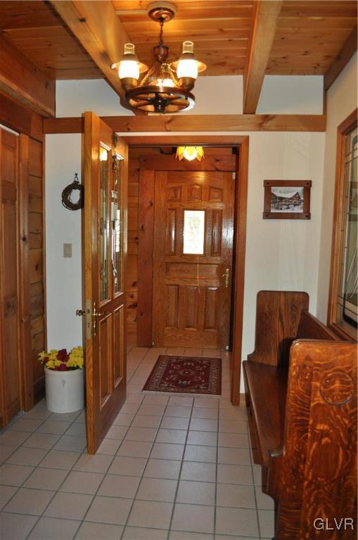 103 Antler Road Bartonsville, PA 18321 - Photo 4 of 32 a room with furniture and a chandelier