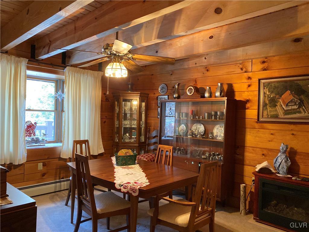 103 Antler Road Bartonsville, PA 18321 - Photo 9 of 32 a view of a dining room with furniture and window