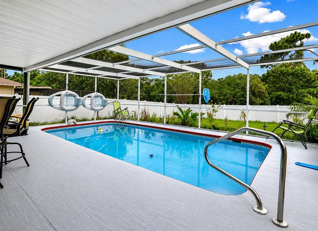 11177 Elgin Boulevard Spring Hill, FL 34608 - Photo 10 of 10 a view of swimming pool with seating space