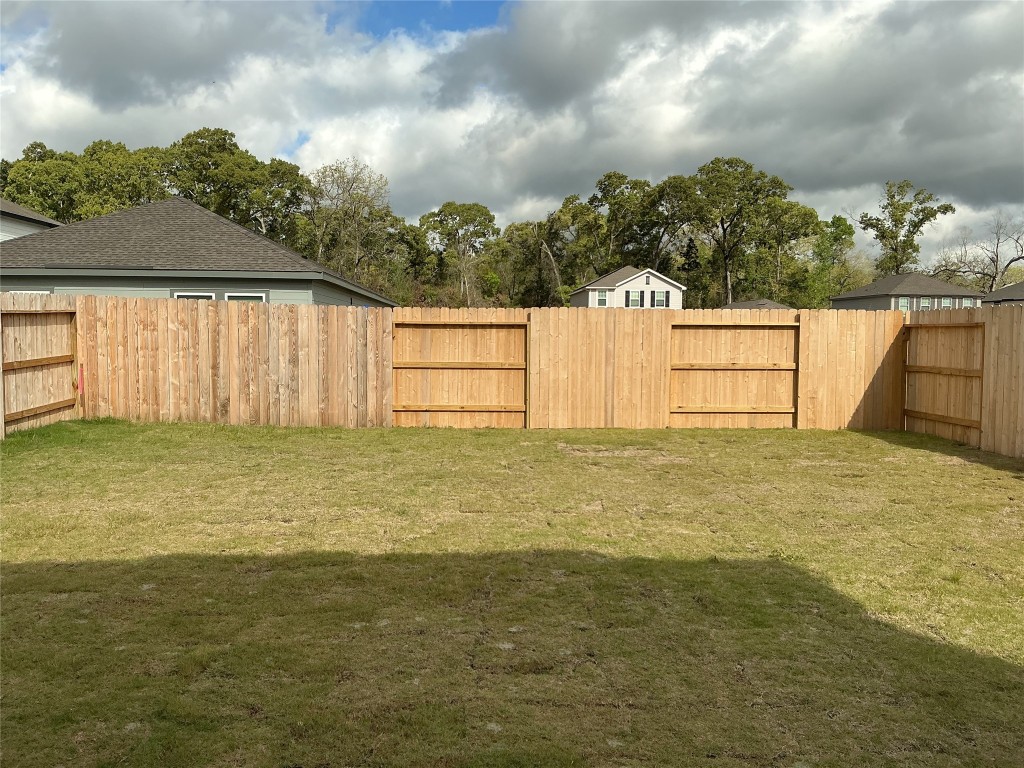 9317 Beryl Lane Conroe, TX 77303 - Photo 10 of 10 a view of an ocean from a yard
