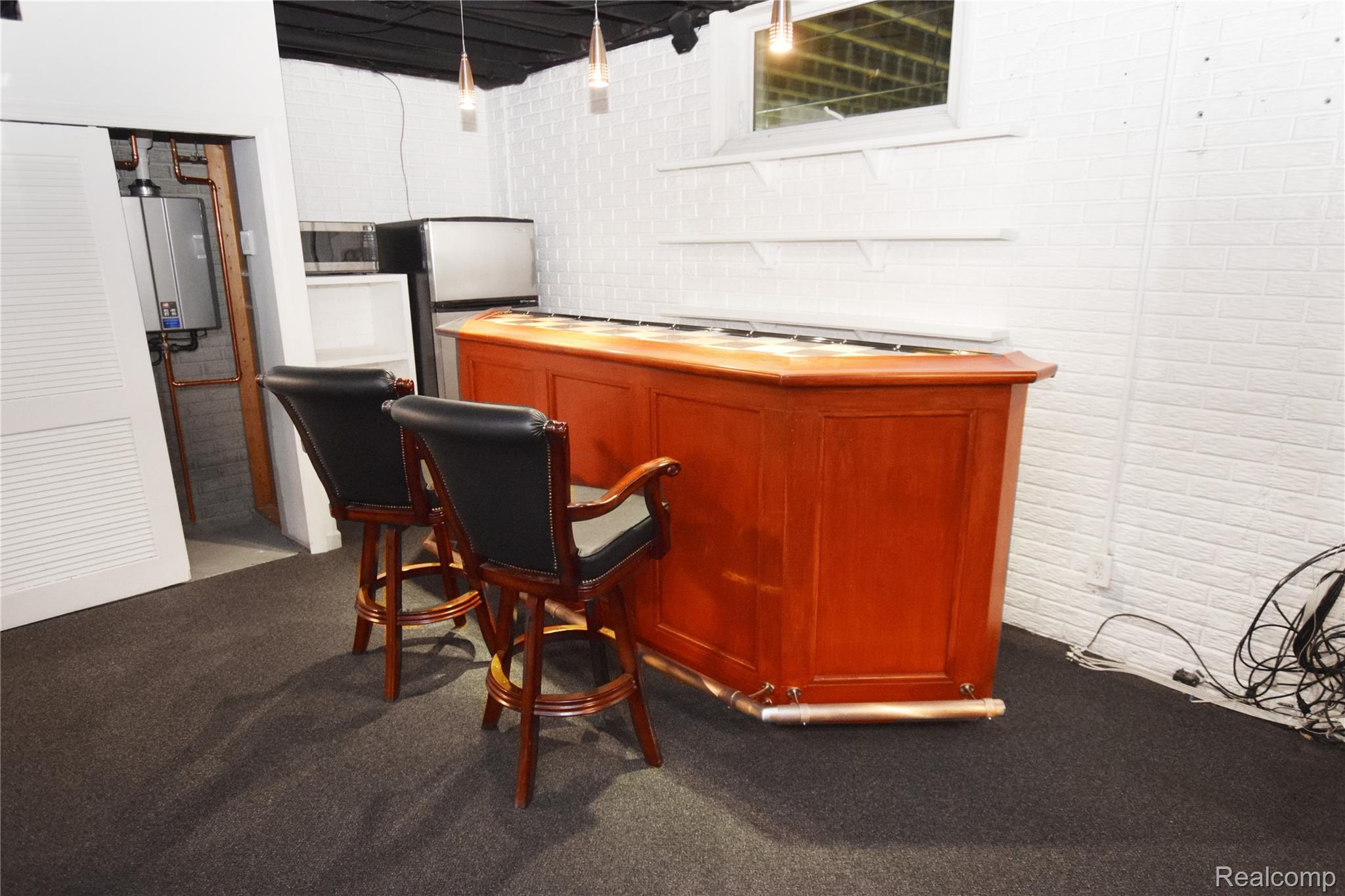 2182 Wiggins Road Fenton, MI 48430 - Photo 19 of 30 Wet Bar in Finished Basement.jpg