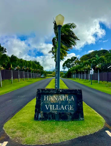 a view of a big yard with a fountain