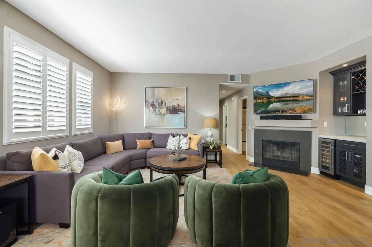 930 Merced River Road Chula Vista, CA 91913 - Photo 14 of 67 a living room with furniture and a fireplace