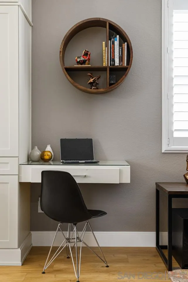 930 Merced River Road Chula Vista, CA 91913 - Photo 23 of 67 a workspace with a table chair and window