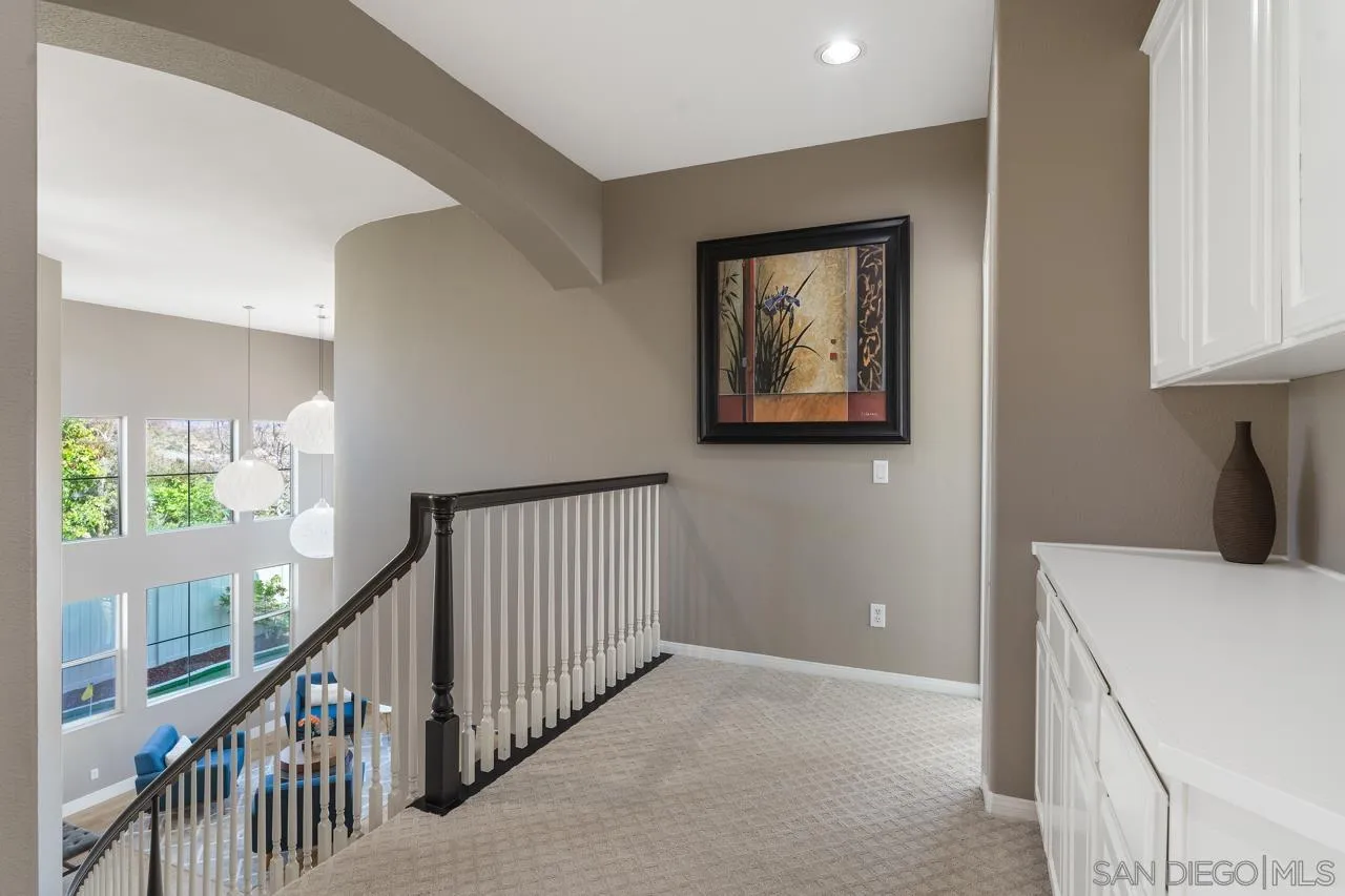 930 Merced River Road Chula Vista, CA 91913 - Photo 33 of 67 a view of a hallway to a room with stair