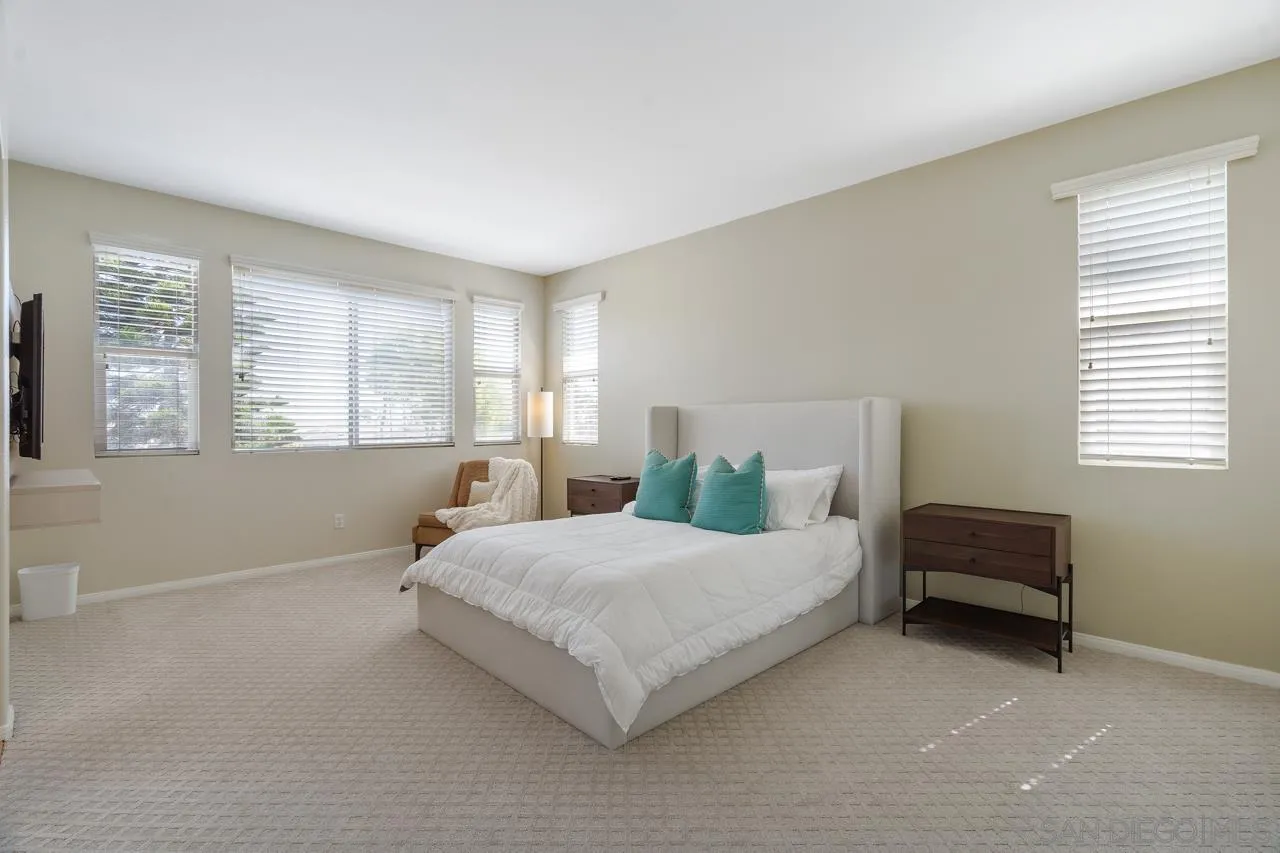 930 Merced River Road Chula Vista, CA 91913 - Photo 34 of 67 a bedroom with a bed and a window