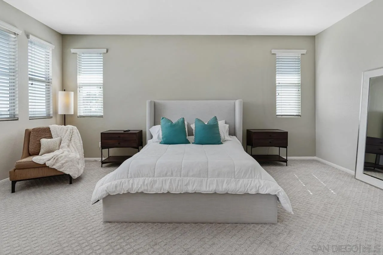 930 Merced River Road Chula Vista, CA 91913 - Photo 36 of 67 a bedroom with bed and window