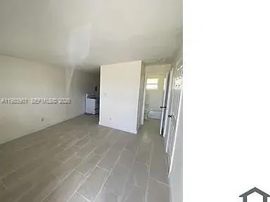 a view of a room with an empty space