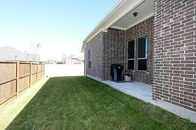 a view of a terrace with a garden