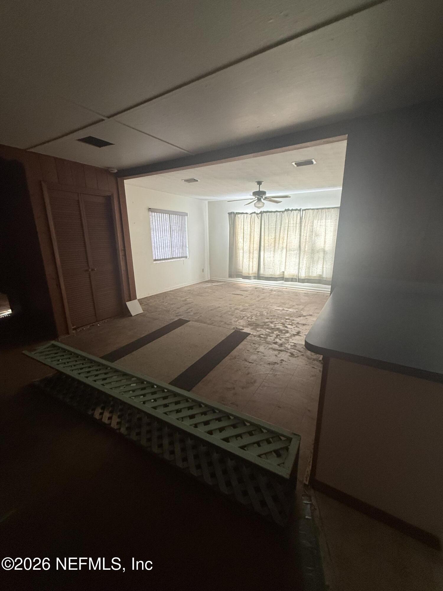 7873 State Road 21 Keystone Heights, FL 32656 - Photo 12 of 16 a view of an empty room with a window