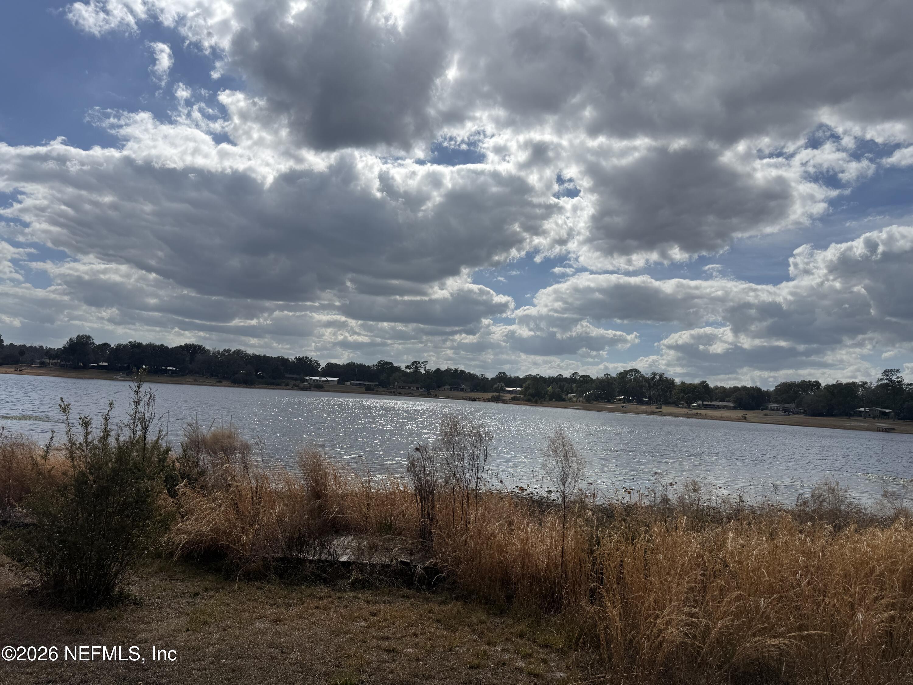 7873 State Road 21 Keystone Heights, FL 32656 - Photo 5 of 16 a view of a lake from a yard