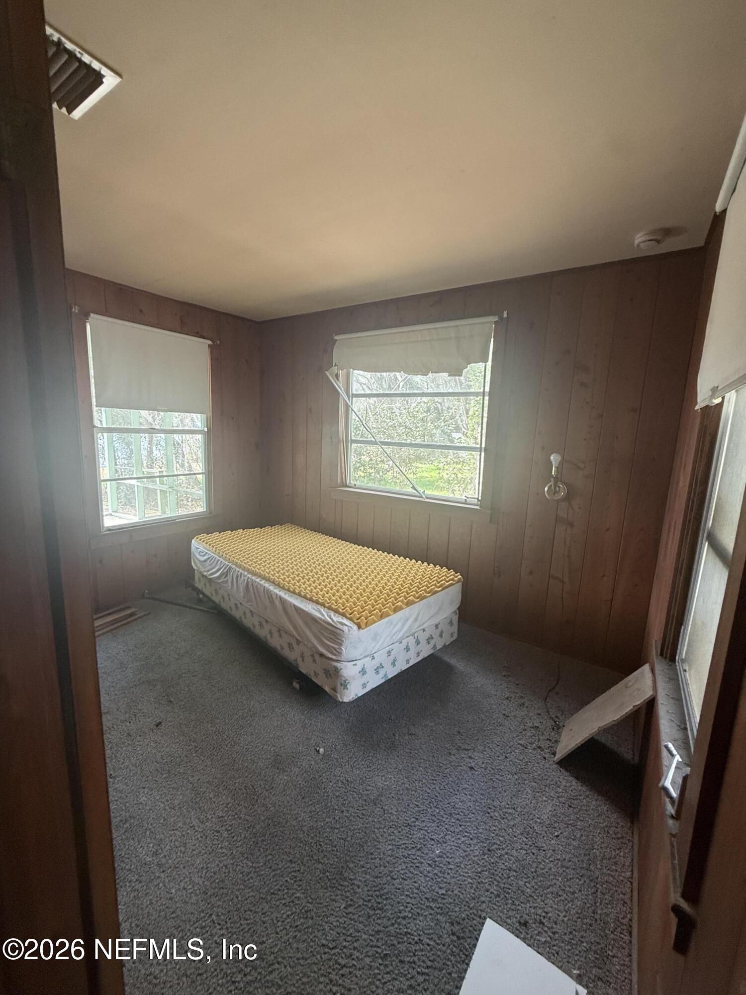 7873 State Road 21 Keystone Heights, FL 32656 - Photo 8 of 16 an empty room with windows