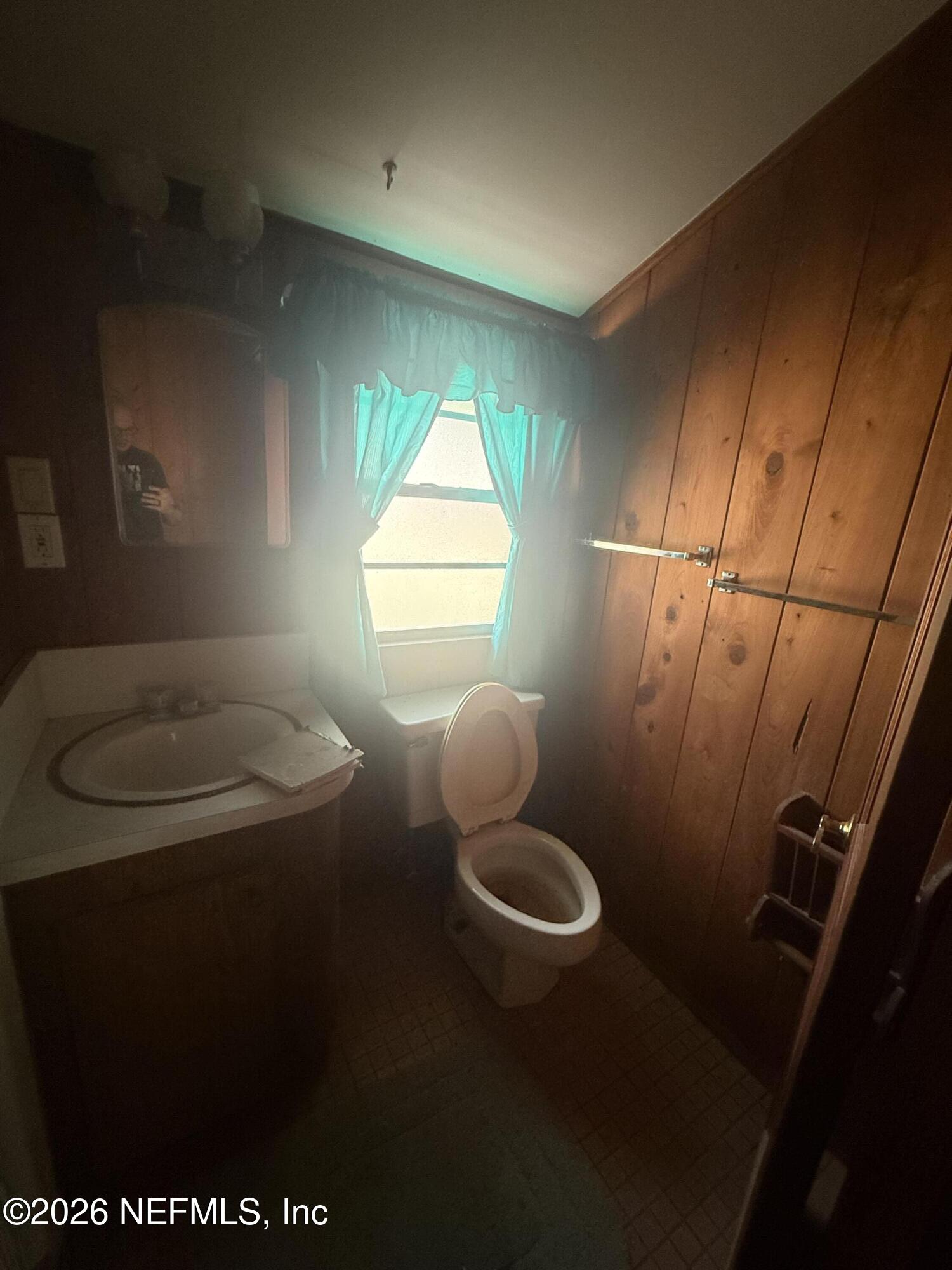 7873 State Road 21 Keystone Heights, FL 32656 - Photo 10 of 16 a bathroom with a toilet and a sink