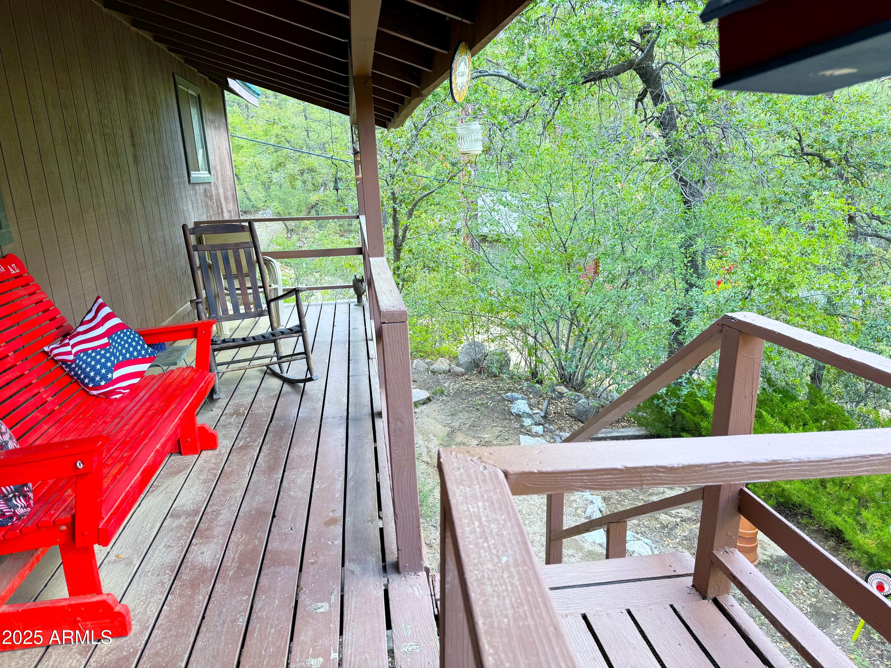 23298 South Towers Mountain Road Crown King, AZ 86343 - Photo 13 of 27 a view of deck with furniture and trees in the background