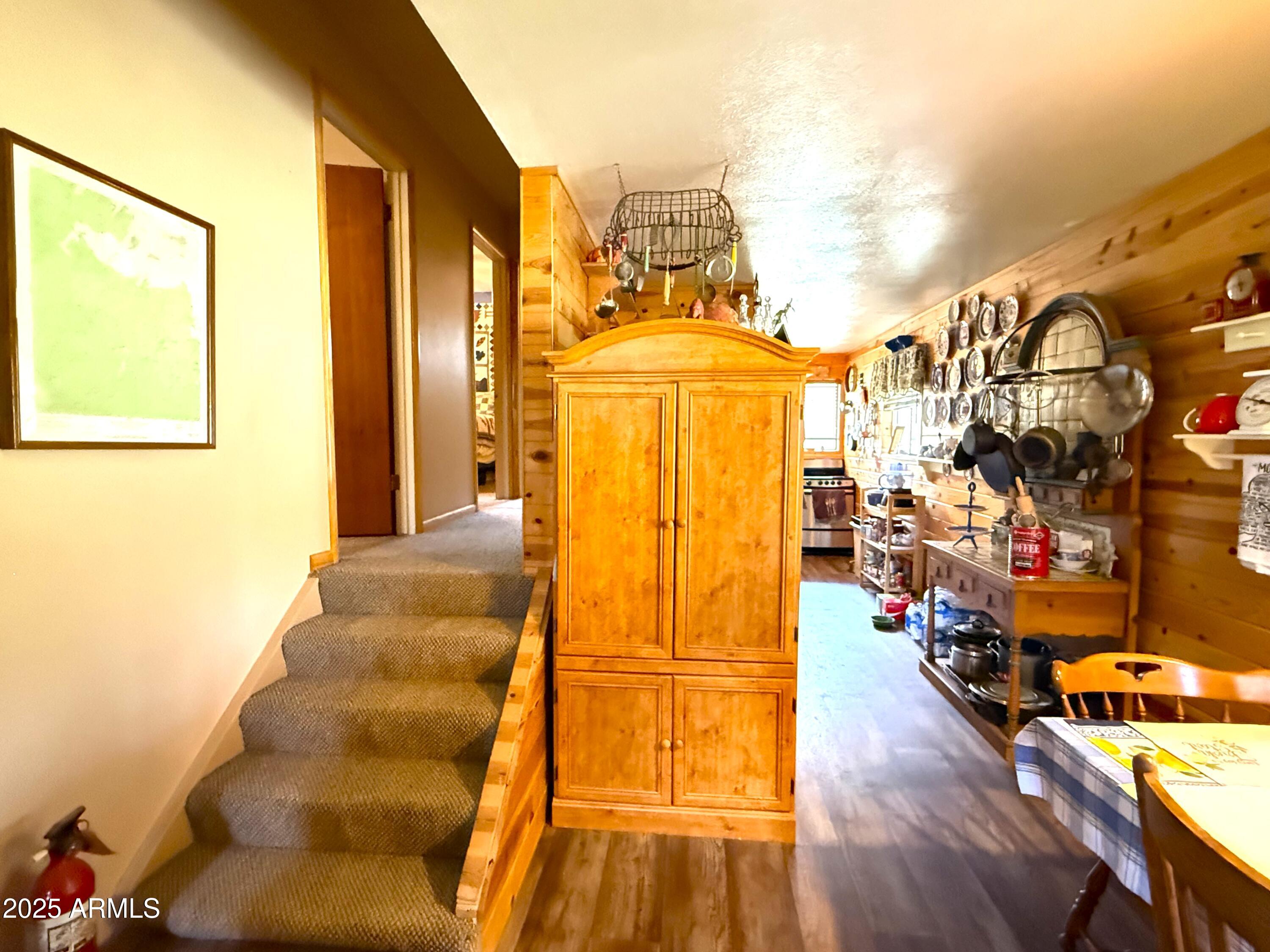 23298 South Towers Mountain Road Crown King, AZ 86343 - Photo 19 of 27 a view of a living room with furniture and a garage