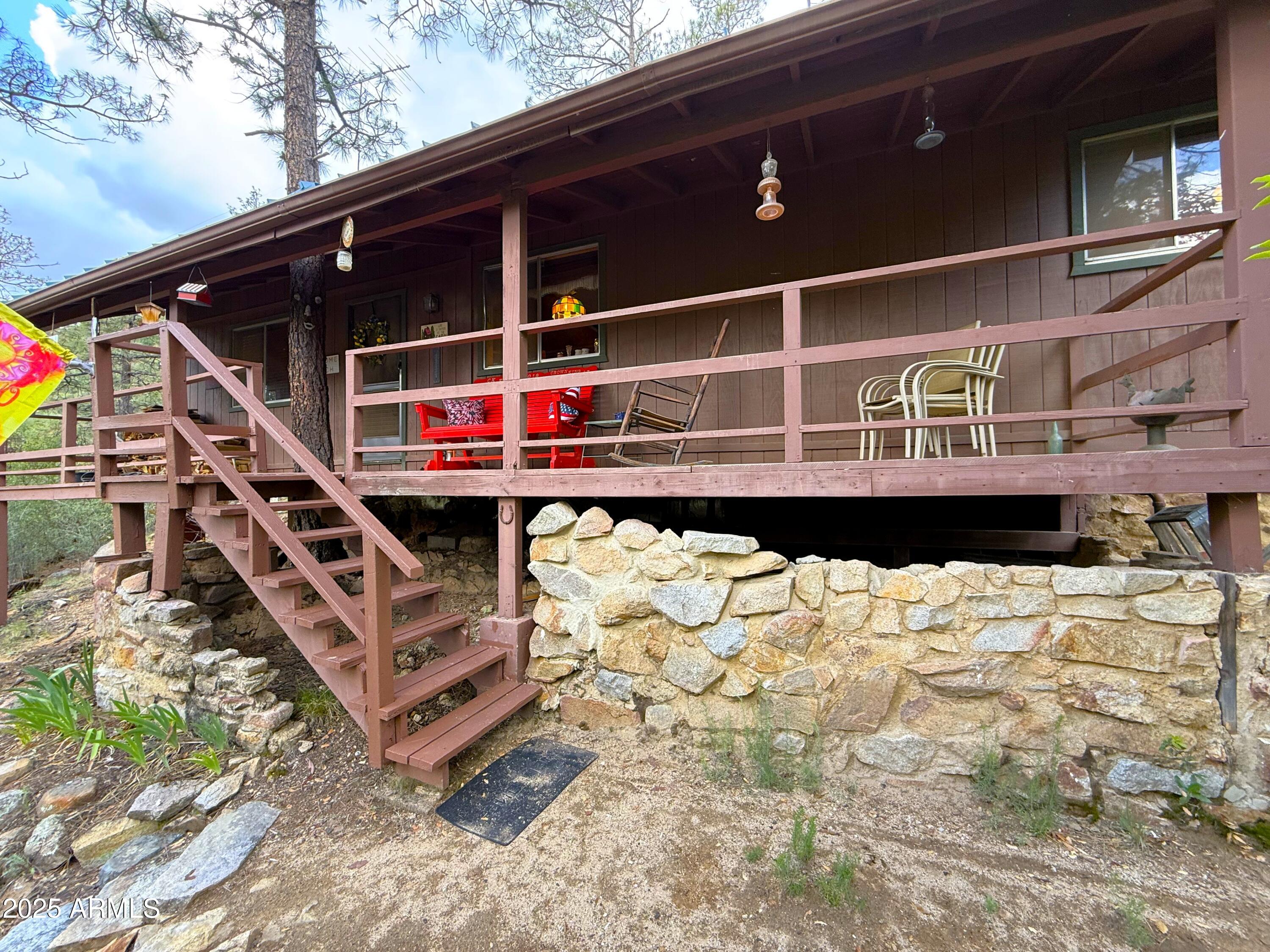 23298 South Towers Mountain Road Crown King, AZ 86343 - Photo 10 of 27 a view of roof deck with wooden fence and floor