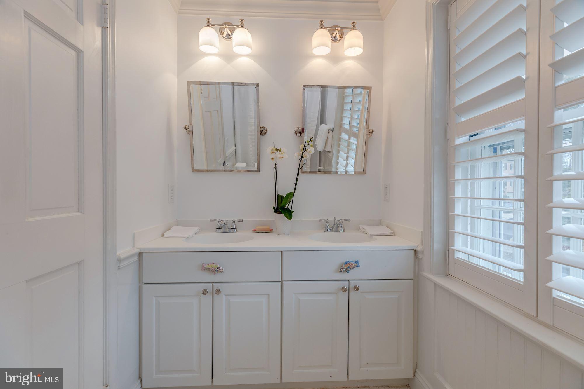 5301 Elliott Road Bethesda, MD 20816 - Photo 18 of 24 Upper Level - Hall Bath with Double Vanity
