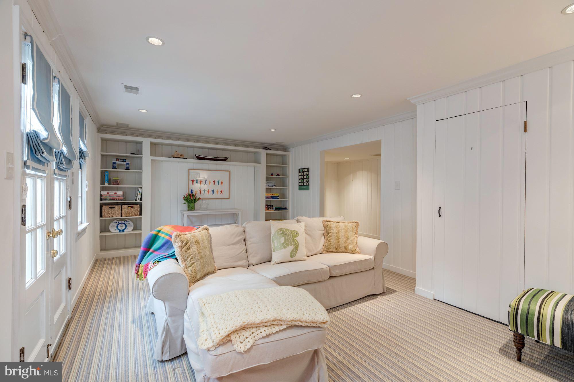 5301 Elliott Road Bethesda, MD 20816 - Photo 20 of 24 Lower Level - Recreation Room with Fireplace