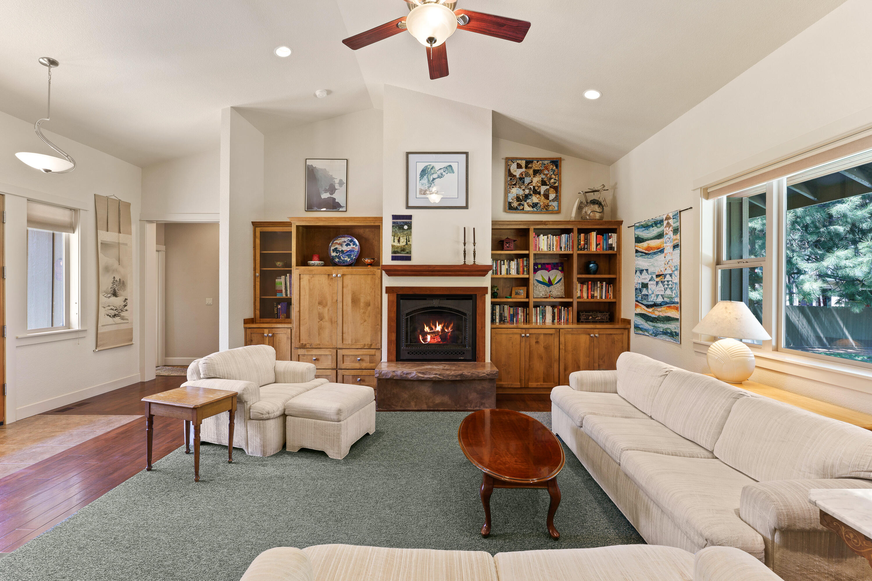 19236 Kiowa Road Bend, OR 97702 - Photo 11 of 52 a living room with furniture and a fireplace