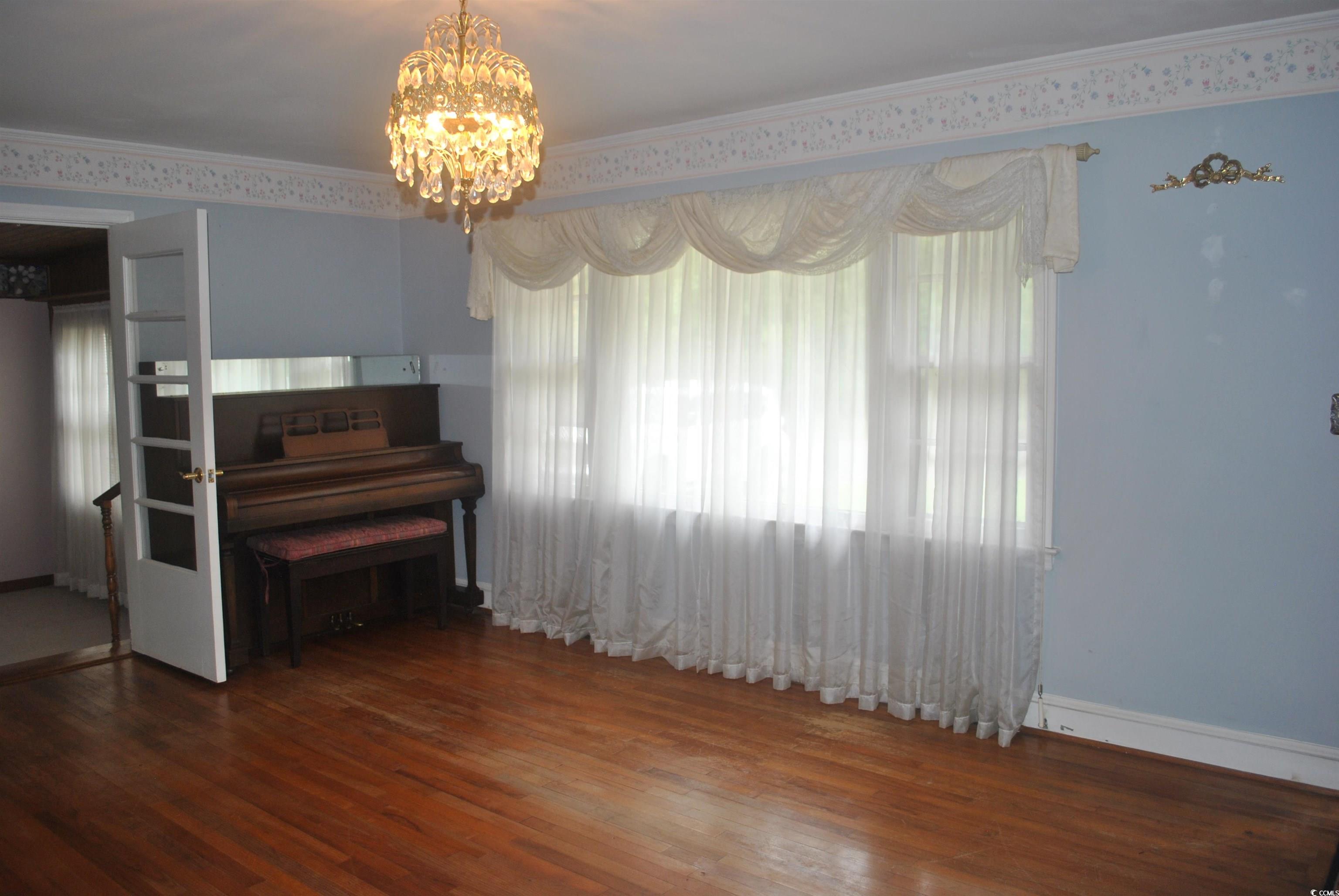 1726 Rice Street Georgetown, SC 29440 - Photo 5 of 28 Interior space with hardwood / wood-style flooring