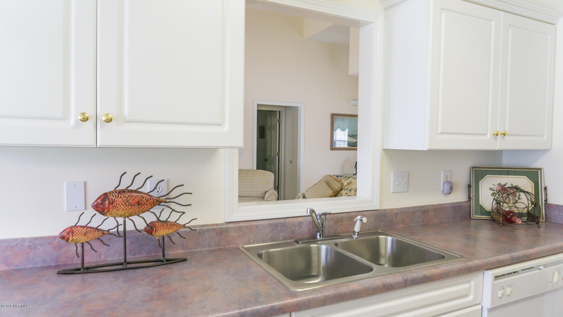 7295 Nursery Road Southwest Ocean Isle Beach, NC 28469 - Photo 20 of 31 Visit with guests while preparing dinner!