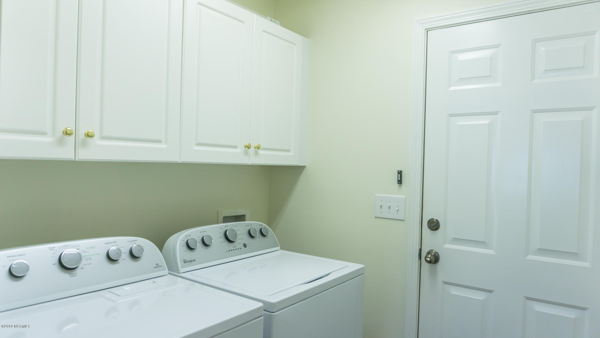 7295 Nursery Road Southwest Ocean Isle Beach, NC 28469 - Photo 22 of 31 Laundry room (no working in a closet!)