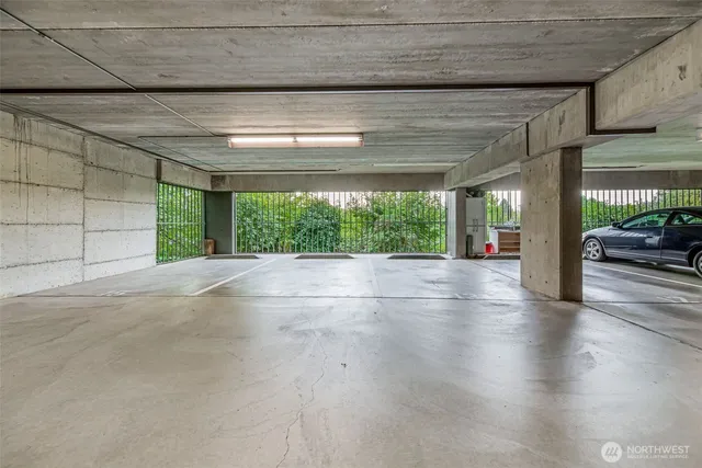 a view of an empty room and a window
