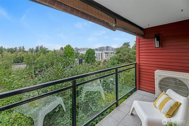 a view of a balcony with furniture