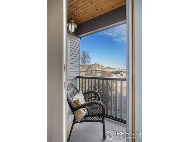 a balcony with a bench