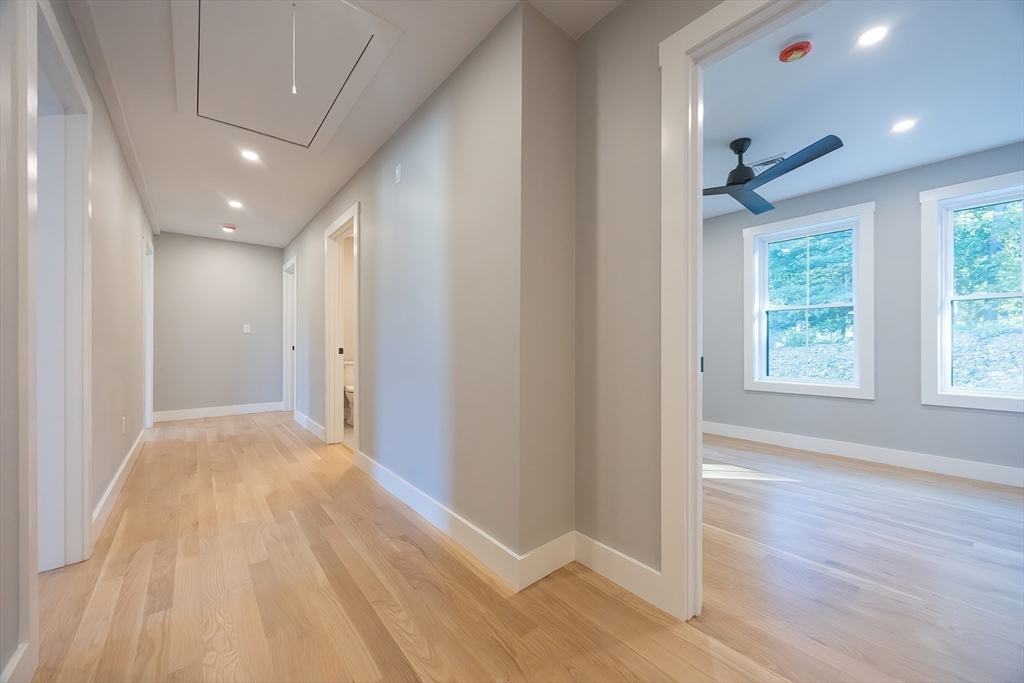 71 Old Nahant Road Wakefield, MA 01880 - Photo 18 of 42 a view of hallway with a window and wooden floor