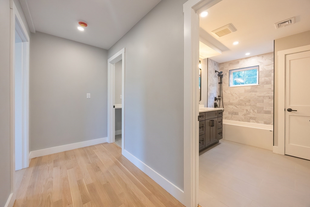 71 Old Nahant Road Wakefield, MA 01880 - Photo 23 of 42 a view of a hallway with a kitchen