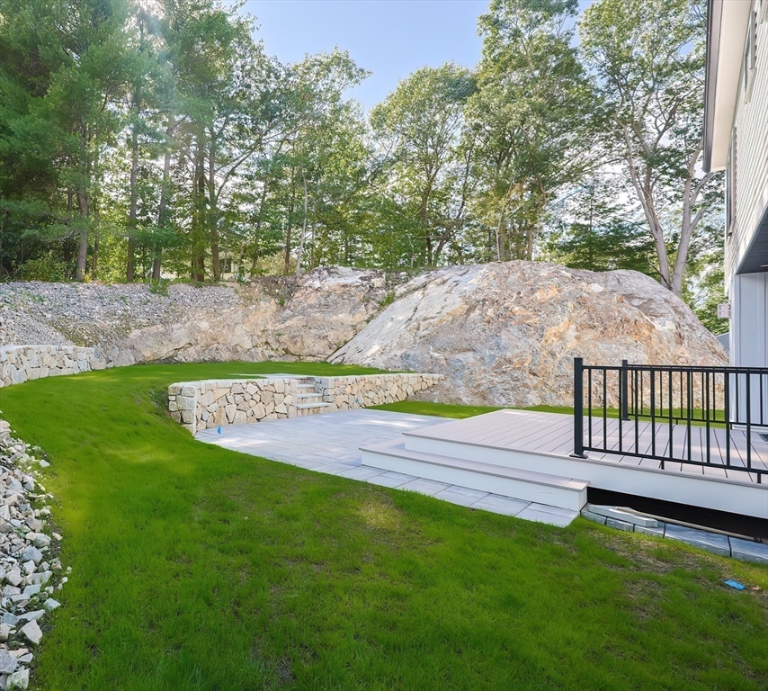 71 Old Nahant Road Wakefield, MA 01880 - Photo 3 of 42 a view of a garden with an outdoor space