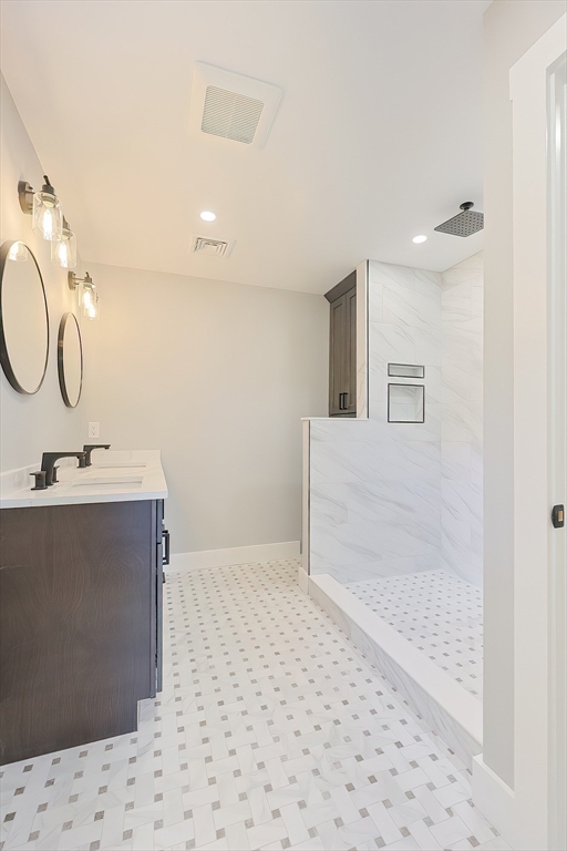 71 Old Nahant Road Wakefield, MA 01880 - Photo 31 of 42 a bathroom with a sink mirror and shower