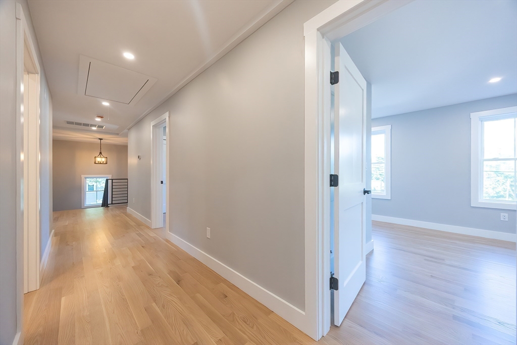 71 Old Nahant Road Wakefield, MA 01880 - Photo 32 of 42 a view of a hallway with wooden floor