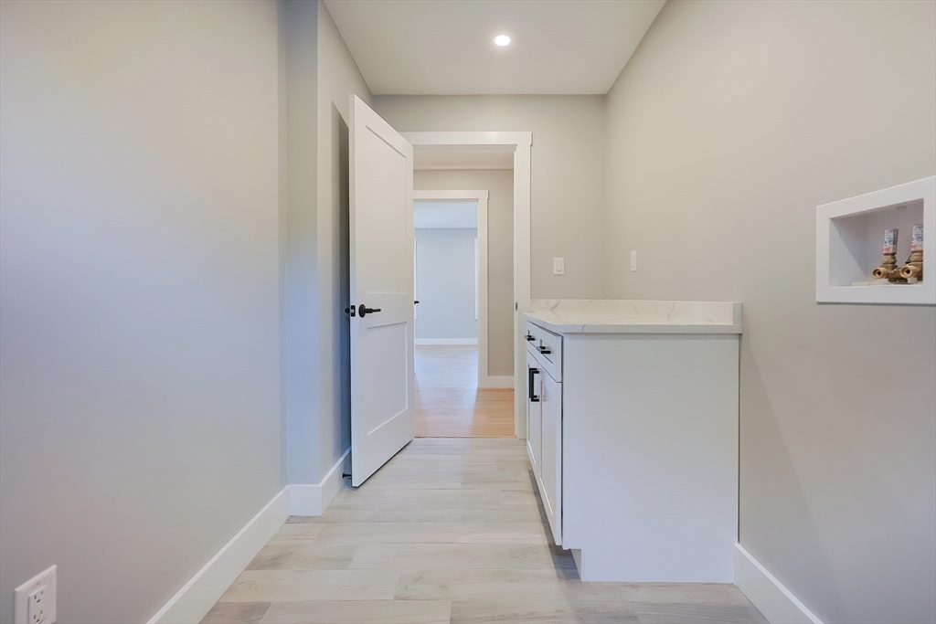 71 Old Nahant Road Wakefield, MA 01880 - Photo 34 of 42 a view of a hallway with closet and a bathroom